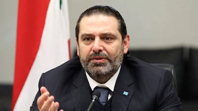 Lebanon's outgoing Prime Minister Saad Hariri gestures during his meeting with his parliamentary bloc. Dalati Nohra via AP