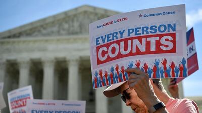Demonstrators rally at the US Supreme Court in Washington, DC, protest a proposal to add a citizenship question in the 2020 Census. AFP