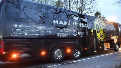 A window of Dortmund's team bus shows noticeable damage. Martin Meissner / AP Photo
