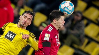 Bayern's Robert Lewandowski in action against Dortmund's Mats Hummels. EPA