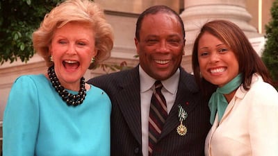 Jones poses with the then-US ambassador to France Pamela Harriman (left) and singer Tamia after receiving the Officer of Arts and Letters insignia at Harriman's Paris residence in 1996. AFP