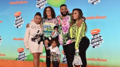 Producer/songwriter DJ Khaled, second right, wife Nicole Tuck, second left, son Asahd Tuck Khaled, and family members. AFP