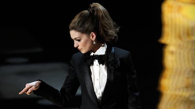 Anne Hathaway wore a Lanvin tuxedo when she presented the 83rd Annual Academy Awards on February 27, 2011. WireImage