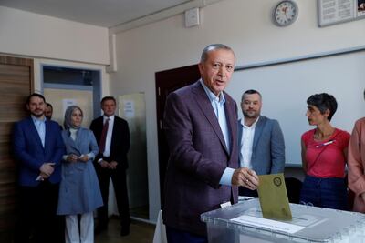 Turkish President Recep Tayyip Erdogan casts his ballot. Reuters