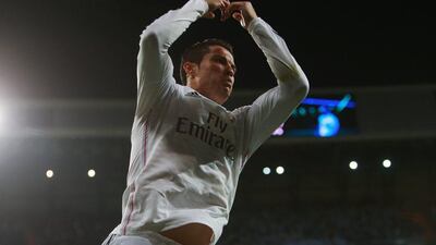 Real Madrid's Cristiano Ronaldo celebrates levelling again, at 2-2, against Schalke on Tuesday night in the Champions League for his second goal, setting a record most goals scored in European competitions. Alex Grimm / Bongarts / Getty Images