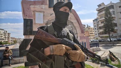 Syrian security forces stand guard in Latakia, which has been the scene of unrest and violence since the end of the civil war. EPA