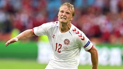 Kasper Dolberg - 9: Forward replaced Yussef Poulsen in starting XI and fired first shot of game well wide of target but no mistake with next effort producing superb curling finish into corner after 27 minutes. Gifted his second goal by Williams’ blunder but an impressive first start of tournament. EPA