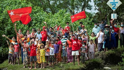 NLD supporters greet to a boat rally. Reuters
