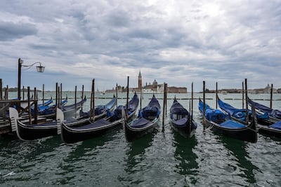 The family managed to enjoy a short period of sight-seeing in Venice before heading to India to sort their travel documents. AFP