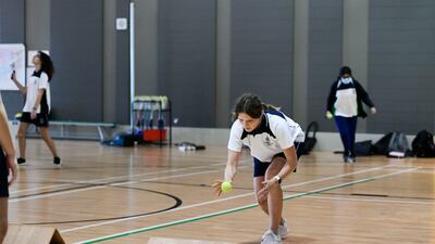 Pupils at Repton Abu Dhabi play the gutter board game. The school has introduced unconventional sports to fight obesity in children. All photos: Khushnum Bhandari / The National