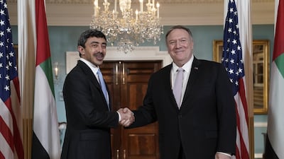Foreign Minister Abdullah bin Zayed bin Sultan Al Nahyan of the United Arab Emirates, left, is welcomed by Secretary of State Mike Pompeo for a meeting at the State Department in Washington, Friday, Nov. 22, 2019. (AP Photo/J. Scott Applewhite)