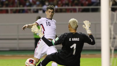 Soccer Football - World Cup - Concacaf Qualifiers - Costa Rica v United States - Estadio Nacional, San Jose, Costa Rica - March 30, 2022 Christian Pulisic of the U. S. in action with Costa Rica's Keylor Navas REUTERS / Mayela Lopez