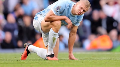 Erling Haaland cannot believe it after missing a glorious chance to score for Manchester City. Getty Images