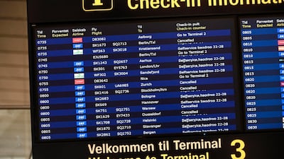 A flight information board shows cancelled flights because of Scandinavian Airlines' pilots strike at Copenhagen Airport on Friday. EPA