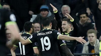 Eden Hazard, right, and Diego Costa, centre, scored the goals for Chelsea in a 2-1 win over West Ham United on Monday night. Kirsty Wigglesworth / AP Photo