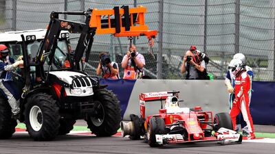 Sebastian Vettel of Ferrari walks away from his car after stopping during the Formula One Austrian Grand Prix at Red Bull Ring on July 3, 2016 in Spielberg, Austria. Mark Thompson / Getty Images