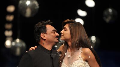 Wendell Rodricks with Deepika Padukone at Wills Lifestyle India Fashion Week in 2011. AFP