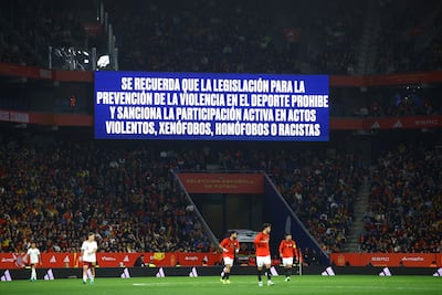 A big screen displays an anti-discrimination message inside the stadium during the match. Reuters