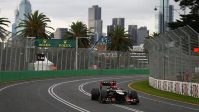 A view of the Melbourne skyline behind the Albert Park track at the 2013 Australian Grand Prix. The 2014 race takes place on Sunday March 16, 2014. Clive Mason / Getty Images / March 17, 2013