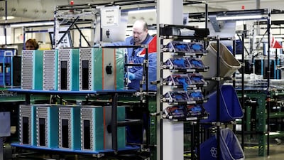 Flextronics International Apple factory employees work on Apple Mac Pro computer assembly. Reuters