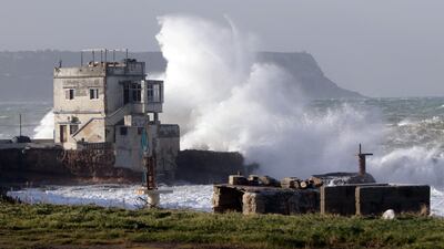 Waves breaking against a building on the shore in the northern Lebanese seaside town of Anfeh, 65 Kms north of Beirut. AFP
