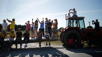 Supporters gather along the course. Reuters