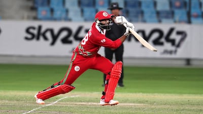 Khawar Ali of Oman plays a shot.