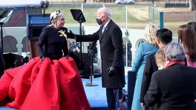 Singer Lady Gaga is greeted by President-elect Joe Biden during the inauguration of Biden as the 46th President of the United States on the West Front of the US Capitol in Washington, on January 20, 2021. Reuters