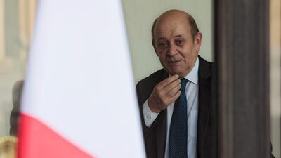 French Foreign Affairs Minister Jean-Yves Le Drian leaves the Elysee Presidential Palace after attending a weekly cabinet meeting. AFP