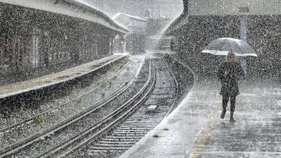 'Just Walking in the Rain', Adrian Campfield: 'My wife and I were standing on the platform waiting for the train at Waterloo Station in London, England. We had been walking around London for the day taking photos and were on the way home. Without any warning the heavens opened and the storm broke thunder and lightning everywhere. We both ran for cover under the platform shelter as did all the other waiting passengers. I saw this lone woman walking towards me with the umbrella up and I had enough time to get the camera ready. I zoomed in a little, set the speed at 1000/iso to freeze the falling raindrops and this was the result.'