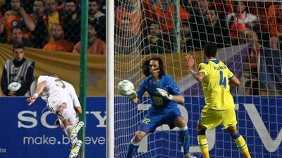 Real Madrid's Karim Benzema scoring in the 3-0 win against APOEL.