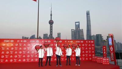 From left to right, Rickie Fowler, Justin Rose, Bubba Watson, Adam Scott and Martin Kaymer do a promotional event along the Bund in Shanghai, with a view of the city's skyline in the background, on Monday ahead of Thursday's star to the WGC-HSBC Champions tournament. Aly Song/ Reuters / November 4, 2014