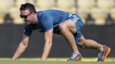South Africa's A.B. de Villiers warms up during a practice session on the eve of their third test cricket match against India at Nagpur, India, Tuesday, Nov. 24, 2015. (AP Photo/Rafiq Maqbool)