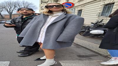 A shirt dress worn under an oversized coat