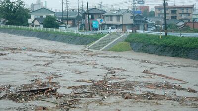 Rising water caused by heavy rain is seen at Kuma river in Yatsushiro, Kumamoto prefecture. AFP
