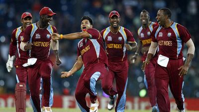 Howzat: West Indies bowler Ravi Rampaul, third left, celebrates with teammates after dismissing Australian batsman David Hussey during the Twenty20 World Cup semi-final match in Colombo, Sri Lanka. Aijaz Rahi / AP Photo