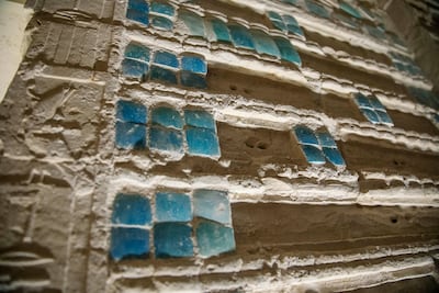 The south tomb’s galleries are decorated with blue faience tiles. AP