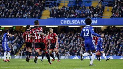 Chelsea forward Pedro shoots to score his side’s opening goal. Frank Augstein / AP Photo