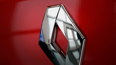 FILE - In this Jan.24, 2019 file photo, the logo of French car maker Renault is pictured at Renault headquarters in Boulogne-Billancourt, outside Paris. France's Renault saw its sales and earnings drop last year and says 2020 will be tough due to the need for investment in new technologies at a time when the market is shrinking. (AP Photo/Christophe Ena, File)