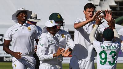 South Africa bowler Marco Jansen, second right, celebrates with teammates after the dismissal of India opener KL Rahul for 10. AFP
