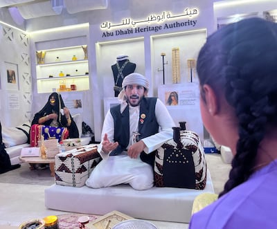 Emirati folk singer Nahyan Mubarak Al Mansoori at the Abu Dhabi Heritage section at Beijing International Book Fair. Saeed Saeed / The National