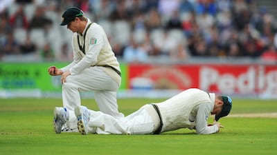 Australia's pacemen continued to steam in and create chances. Here, though, Clarke, right, and Steve Smith failed to take a catch to dismiss Joe Root. Stu Forster / Getty Images