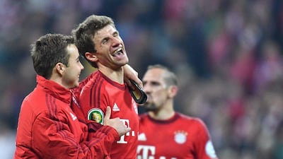 Bayern Munich forward Thomas Muller, centre, has said the next few weeks will contain "little finals" for the Bundesliga leaders. Peter Kneffel / EPA
