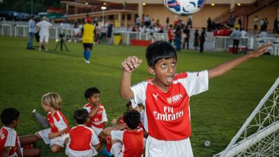 Mesut Ozil visits Arsenal Soccer School at The Sevens Stadium. Victor Besa for The National