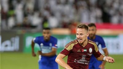 Balazs Dzsudzsak takes the penalty that leads to Al Wahda’s opening goal.