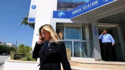 A subsidiary of Qatar Telecom paid $1.2 billion for the remaining half of its joint venture in Tunisia.