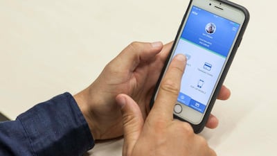 Now Money provides payroll services to Gulf-based companies and app-based accounts with physical debit card and remittance options for low-income workers. Photo: Antonie Robertson / The National