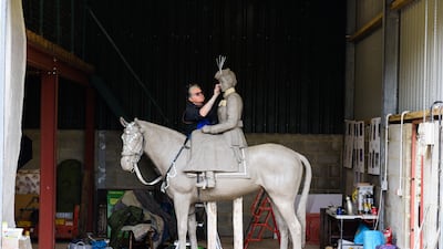 Sculptor Caroline Wallace works on a sculpture of Queen Elizabeth II riding the horse Burmese, which will be installed at the Royal Military Academy Sandhurst. Photo: Miranda Meiklejohn