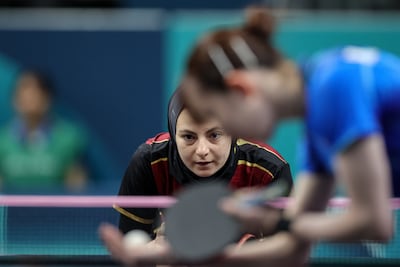 Dina Meshref of Egypt in action during her singles match against Hina Hayata of Japan. EPA