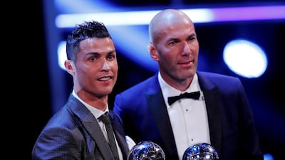 Cristiano Ronaldo, left, and Zinedine Zidane are likely to face a less friendly crowd at Girona than they did in London for the Fifa awards. Eddie Keogh / Reuters